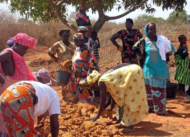 Click to view full size About 70 women in Keur Moussa contribute their labor for two hours twice a week to construct and maintain dikes and other erosion control measures