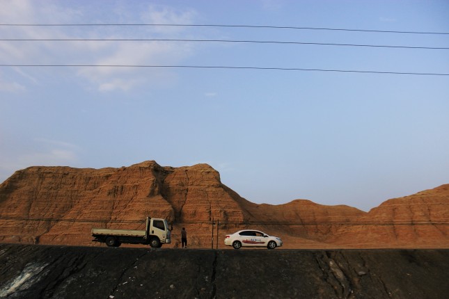 A desert road near Kuqa. Photo credit Meredith Peng, 2016.