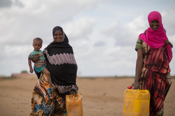Girls in jigjiga, jila alu kebele on their way to fetch water from the nearby water point which is recently started by unicef/ethiopia. they explain, their life is much improved in which they get cleaner water in their nearby. ©UNICEF Ethiopia/2016/Tesfaye