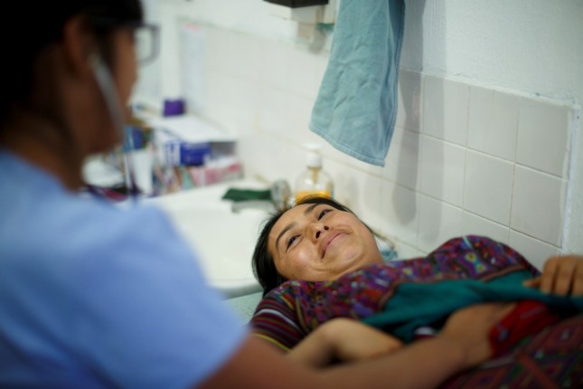 Pregnant women, mothers, and children wait to consult with nurses and doctors, March 6, 2018, courtesy of the Pan American Health Organization.