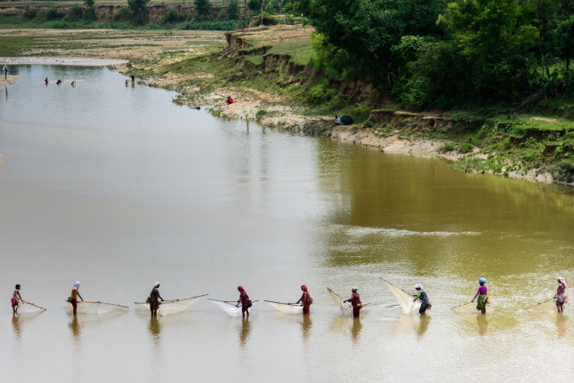 Women fishing in the Terai region of Nepal. The USAID Paani program will enhance Nepal’s ability to manage water resources for multiple uses and users through climate change adaptation and the conservation of freshwater biodiversity. Photo by Olaf Zerbock, USAID.