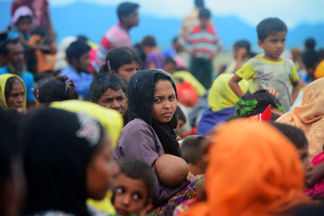 Rohingya,Refugees,Cross,Into,The,Mainland,After,Arriving,In,Bangladesh