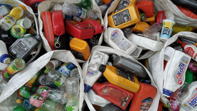 Waste plastic bottles from automobile oils and beverages