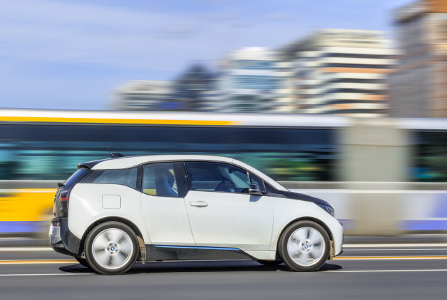 BEIJING-OCTOBER 28, 2016. BMW i3 electric car downtown. Researchers and trend watchers predict that electric cars will account for two thirds of the cars on the roads of 50 major world cities by 2030.