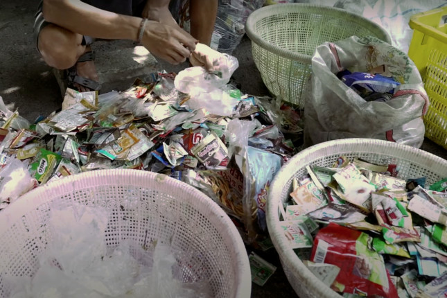 a person sorting plastic waste
