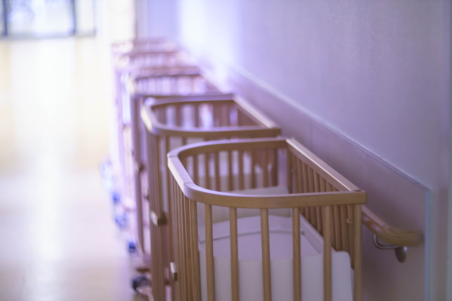 Close,Up,Of,A,Range,Of,Empty,Baby,Beds,In