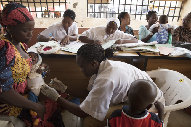 Mothers have their babies vaccinated at the Primary Health Care Maraba, in Karu, Nigeria on June 19, 2018. Photo © Dominic Chavez/GFF