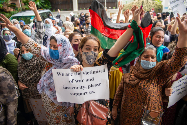 New,Delhi,,India-aug,24,2021:,Afghan,Women,Holding,Placard,Protesting