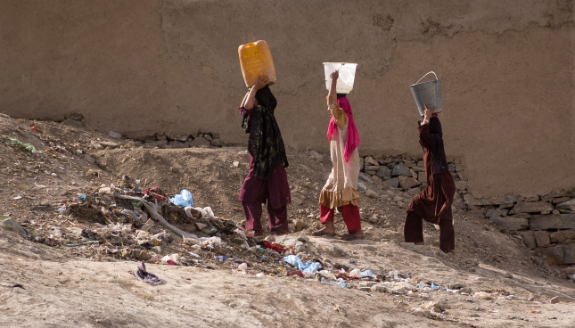 Kabul,,Afghanistan,,Mar,2004:,Women,Carrying,Water,In,Kabul,,Afghanistan