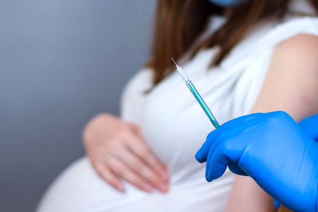 Pregnant,Vaccination.,Pregnant,Woman,In,Face,Mask,Getting,Vaccinated,In