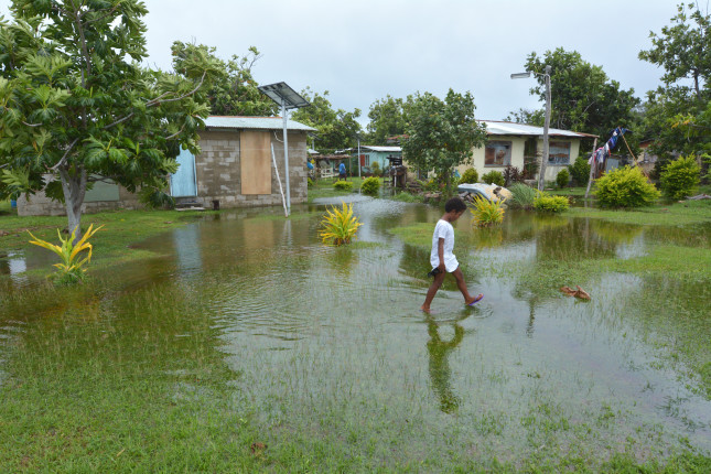 Indigenous,Fijian,Girl,Walking,On,Flooded,Land,In,Fiji.,On