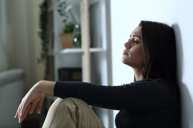 Side,View,Portrait,Of,A,Sad,Depressed,Woman,Complaining,Alone