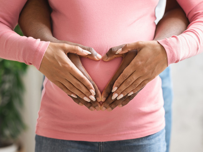 Love,,Family,,Pregnancy,Concept.,Hands,Of,African,Wife,And,Husband