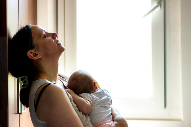 Mother,Embracing,Her,Baby,Girl,While,Sleeping,lifestyle,Concept.tired,Concerned,Mother