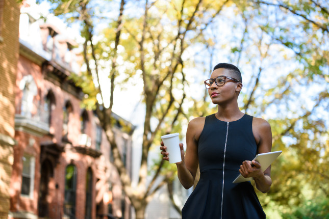 Young,African,Business,Woman,Walking,Down,The,Street