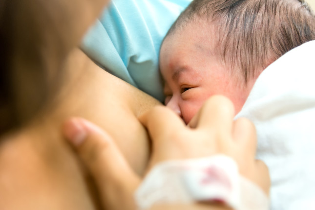 Young,Mother,Breastfeeding,Her,Newborn,Child,In,Hospital,After,Cesarean,